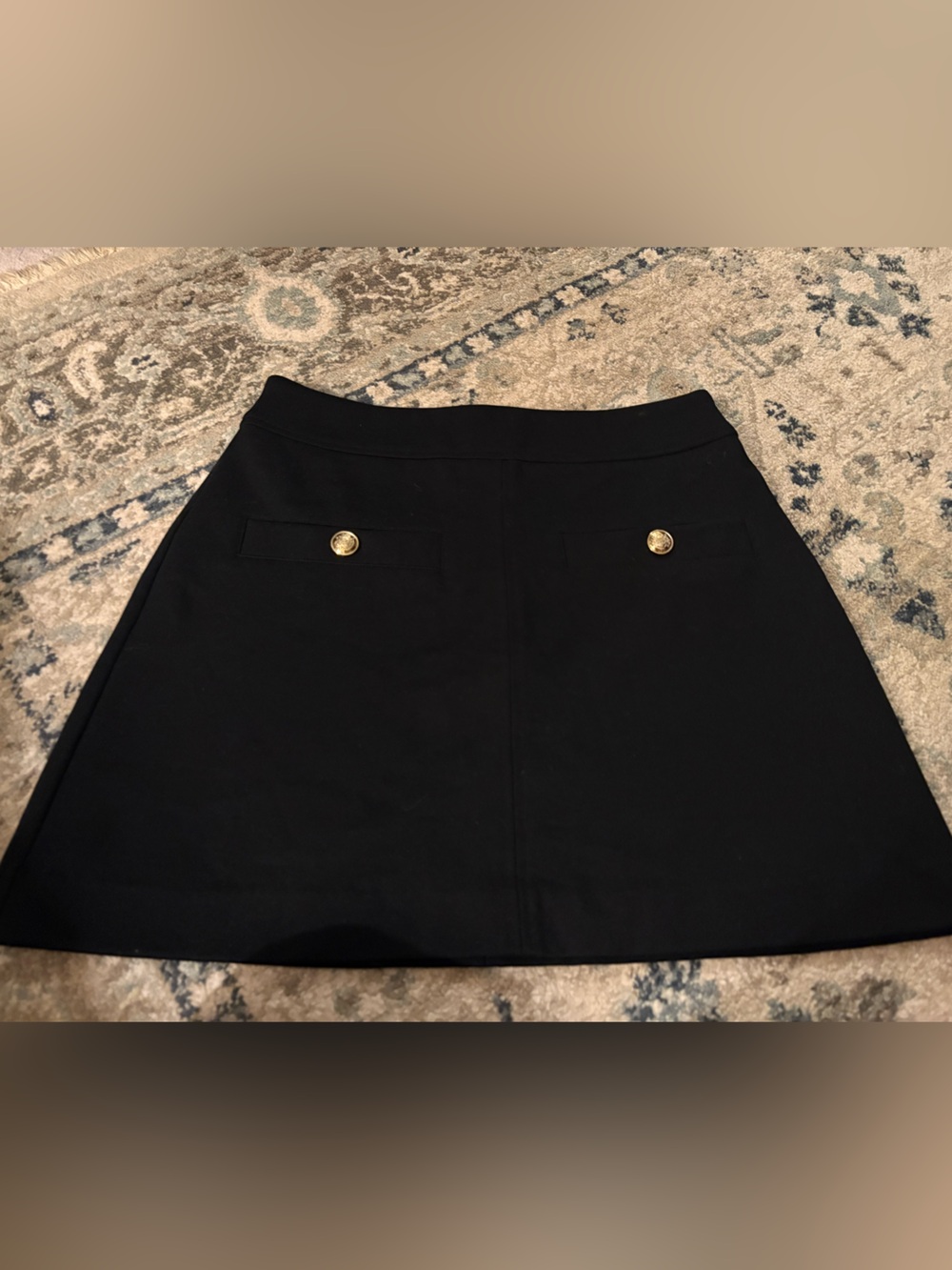 On the 34th size S Black A-Line Mini Skirt with Gold Button Details